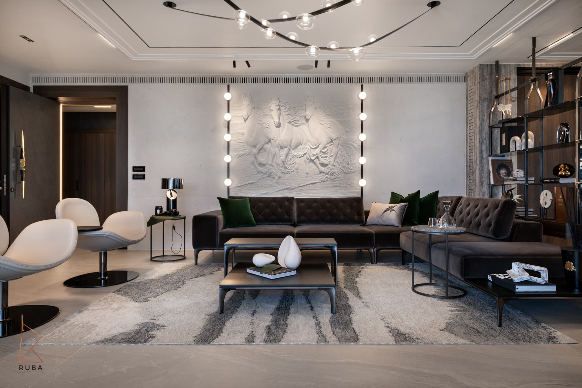 Salon with a white horse relief wall framed by globe lights, tufted sofas and a branch chandelier in Khayyal, designed by Ruba Tannous